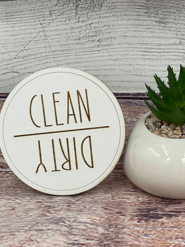 Dishwasher status magnet in kitchen