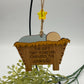 Original photograph of wooden manger ornament with jute hanger and yellow star bead