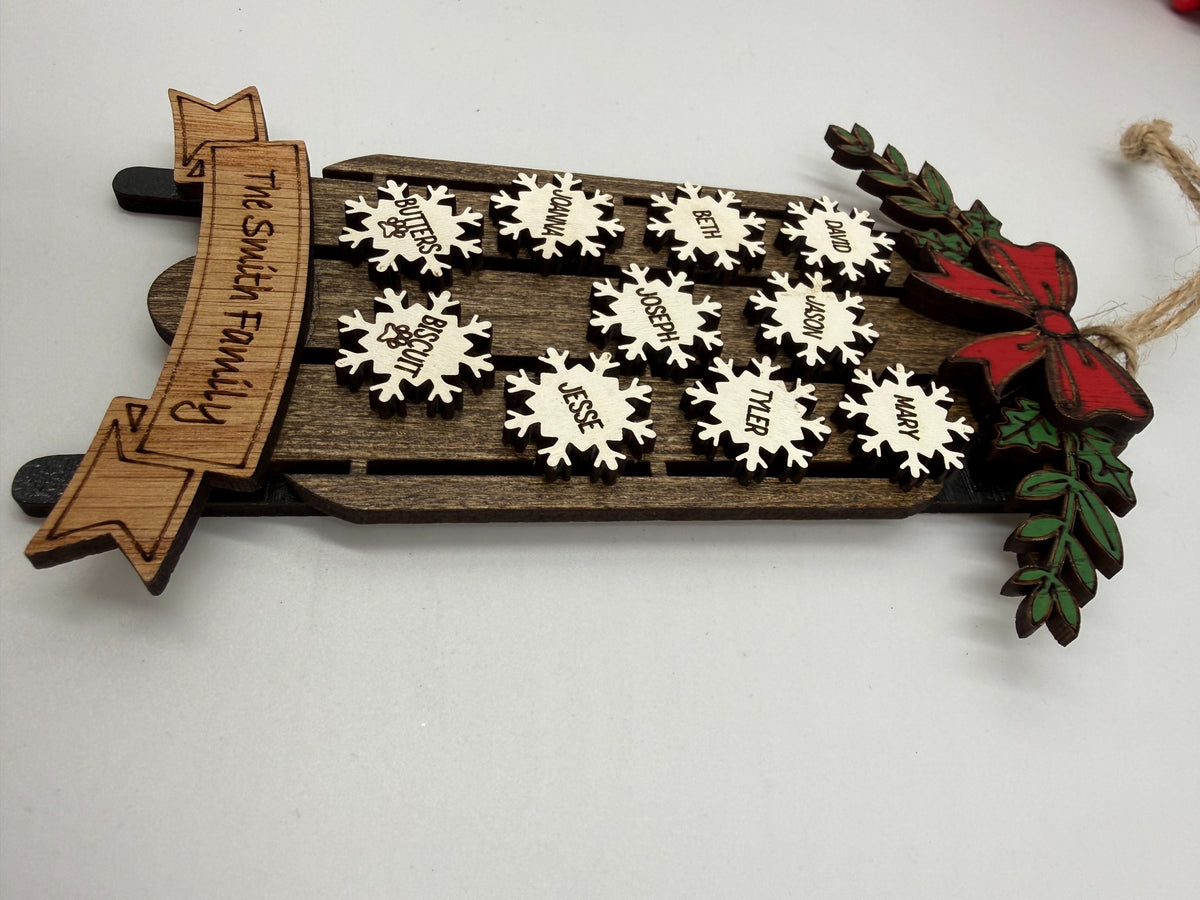 Side view showing layered construction of personalized wooden sled ornament